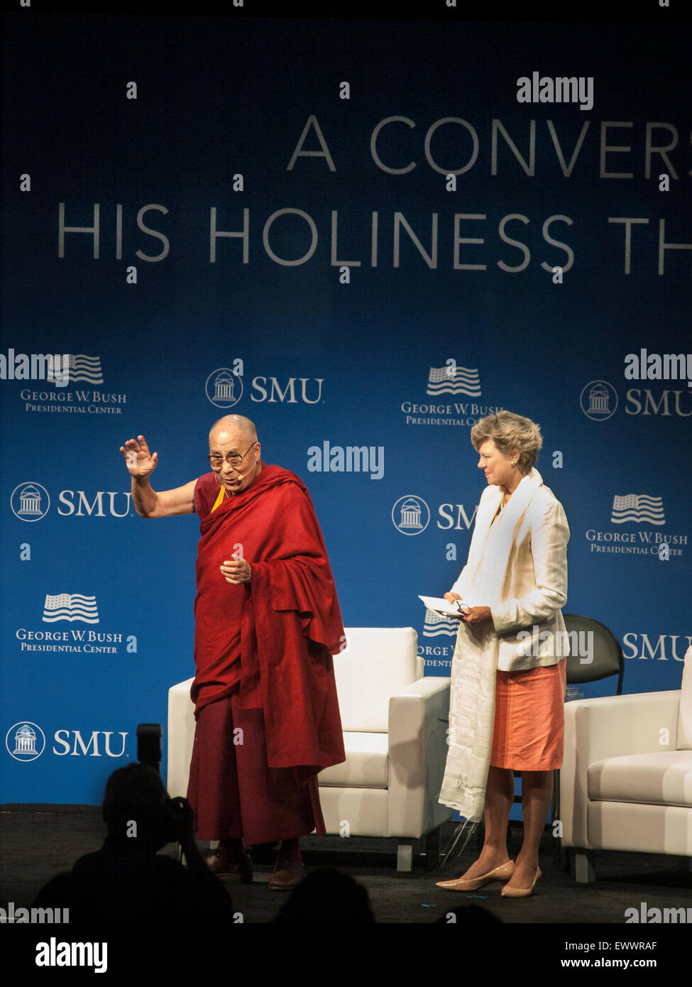 Dallas, Texas, USA. 1st July, 2015. As ABC corespondent Cokie Roberts looks on, the Dalai Lama thanks the audience for wishing him a happy 80th birthday in Dallas, Texas on Wednesday, July 1st. Credit:  J. G. Domke/Alamy Live News Stock Photo