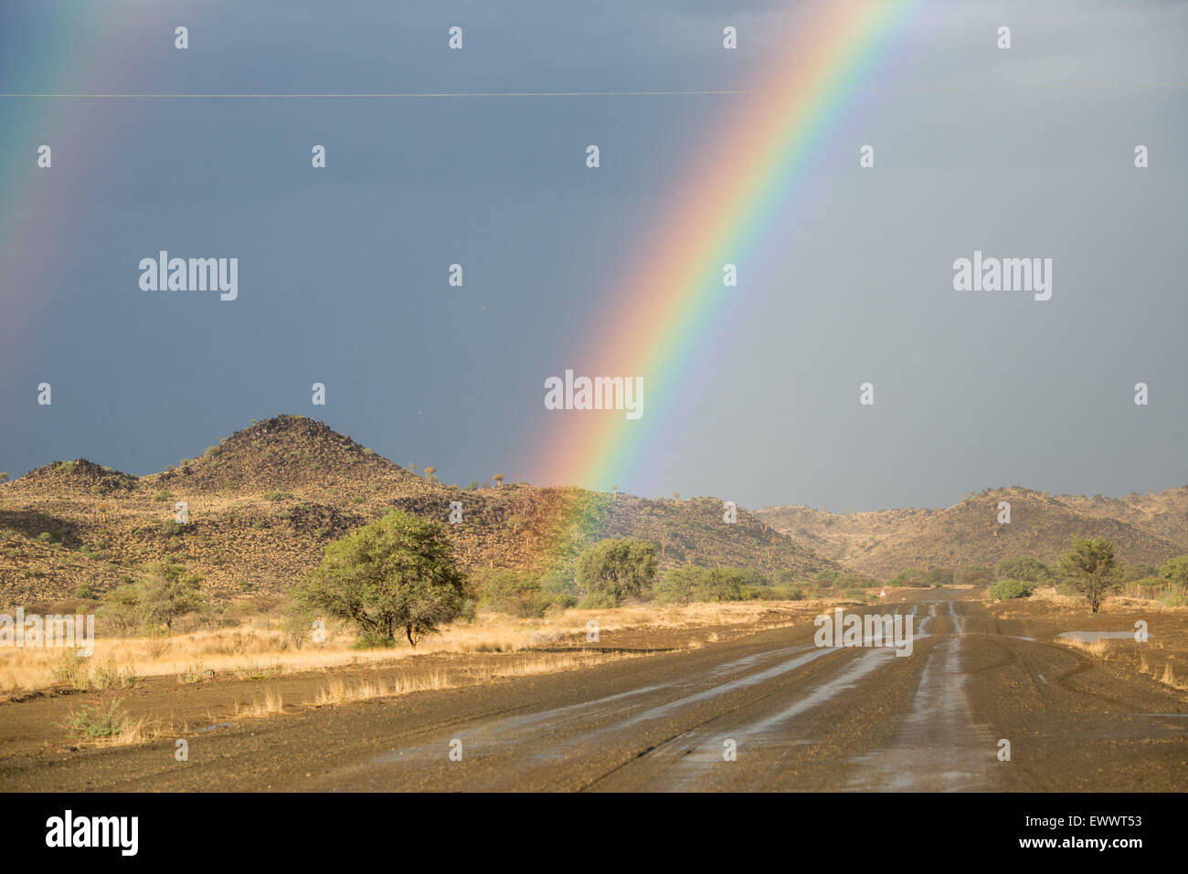 Keetmanshoop, Namibia, Africa - Rainbow in the sky over dry landscape Stock Photo