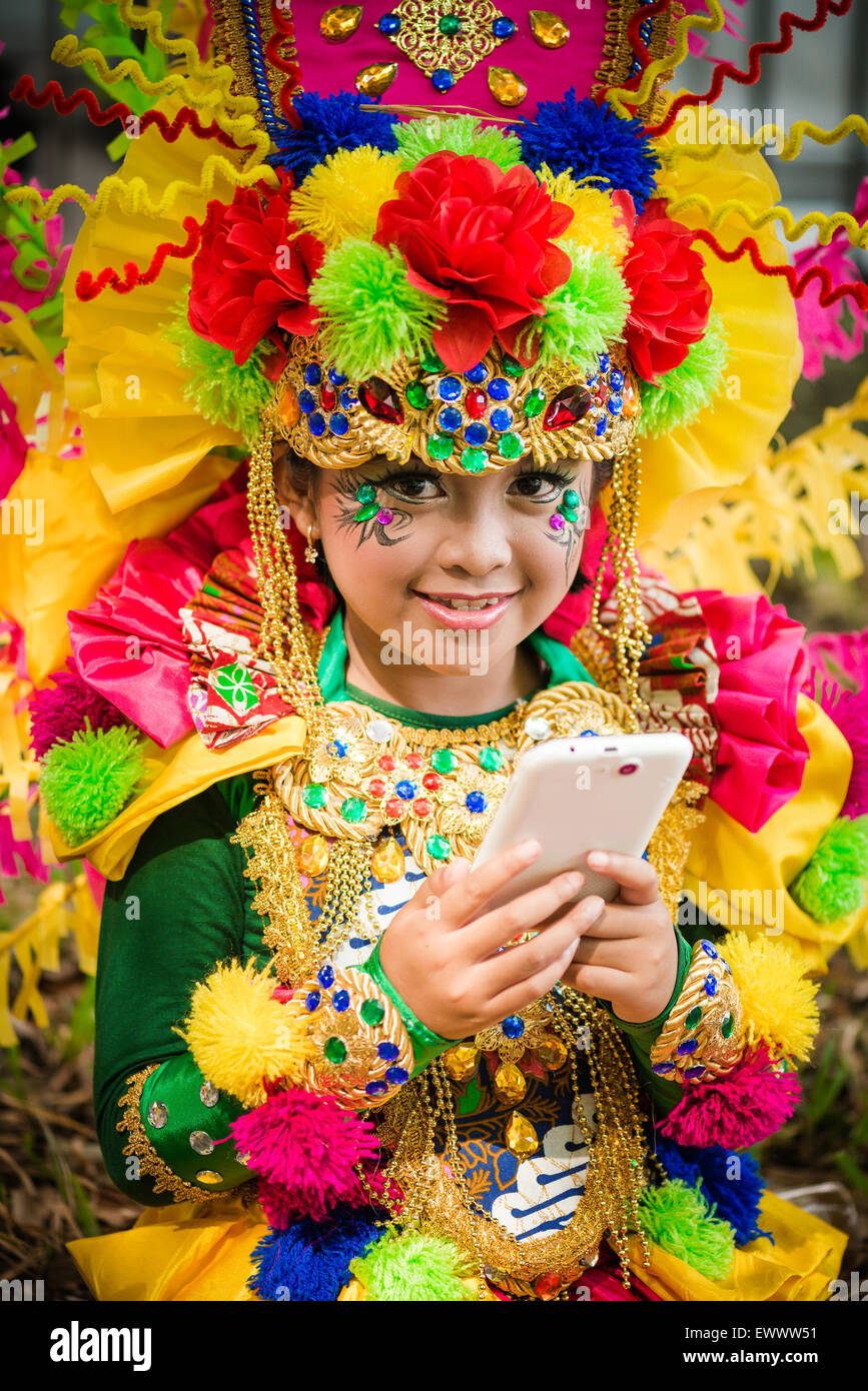 A child at the colourful Jember Fashion Carnival in Jember, Indonesia Stock Photo