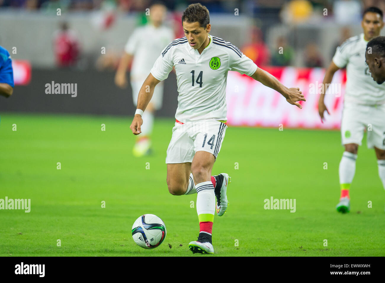 Houston, TX, USA. 1st July, 2015. Mexico forward Javier Hernandez (14) controls the ball during the 1st half of an international soccer match between Honduras and Mexico at NRG Stadium in Houston, TX. Trask Smith/CSM/Alamy Live News Stock Photo