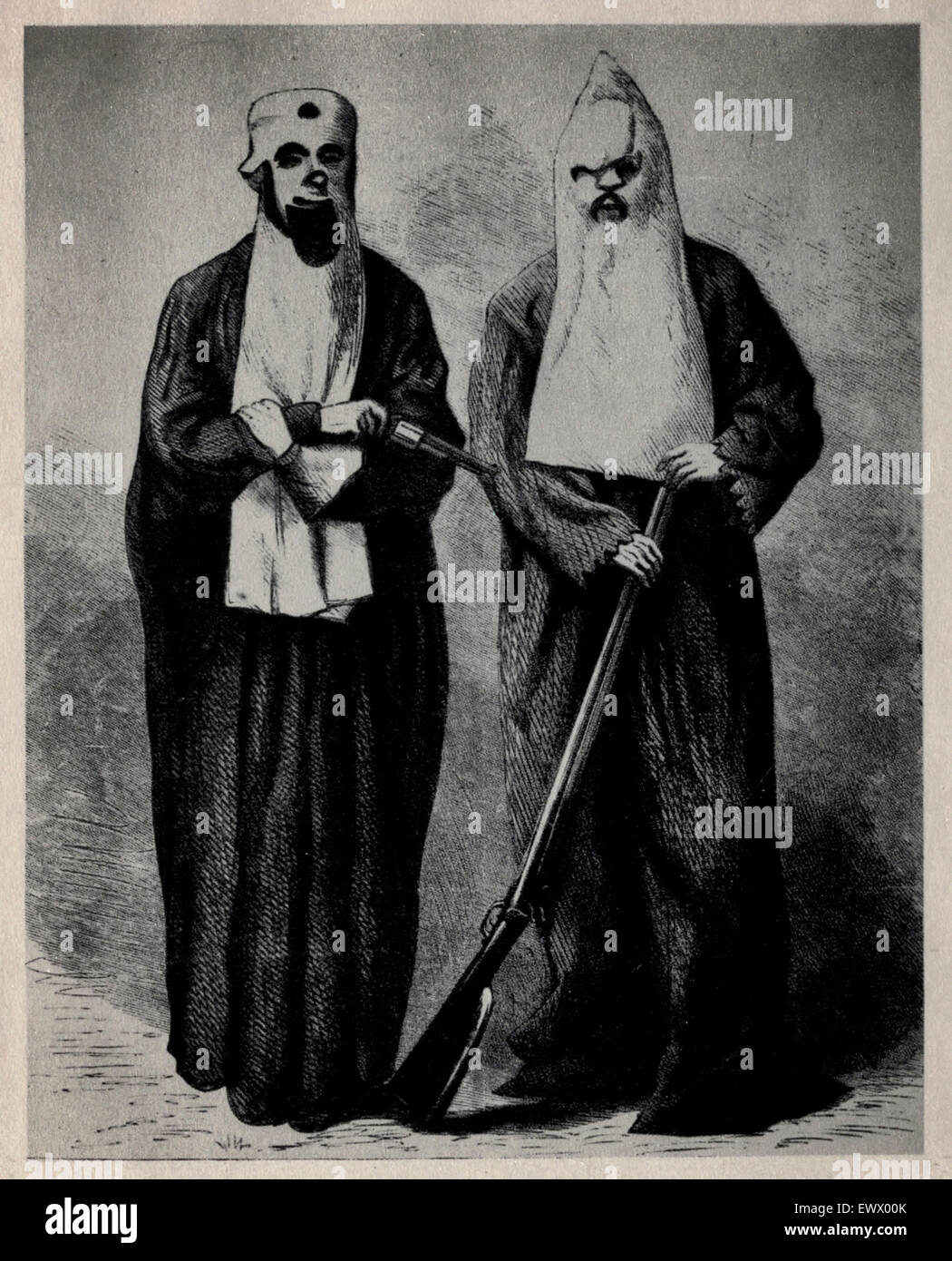 Illustration from Harper's Weekly of February 19th, 1868, showing two Army officers posed in Ku Klux uniforms captured at Huntsville, Alabama Stock Photo