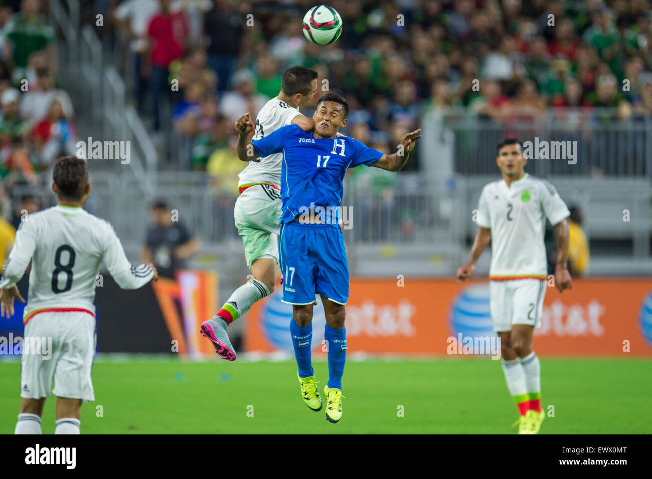 July 1, 2015: Mexico defender Paul Aguilar (22) and Honduras midfielder Andy Najar (17) battle for a header during the 2nd half of an international soccer match between Honduras and Mexico at NRG Stadium in Houston, TX. The game ended in a 0-0 draw.Trask Smith/CSM Stock Photo