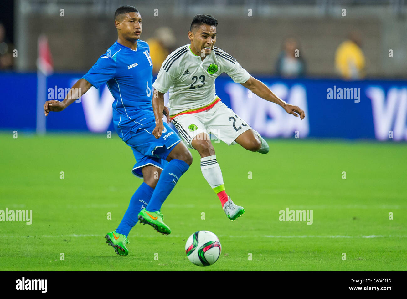 July 1, 2015: Mexico midfielder Jose Juan Vazquez (23) and Honduras midfielder Bryan Acosta (6) battle for the ball during the 2nd half of an international soccer match between Honduras and Mexico at NRG Stadium in Houston, TX. The game ended in a 0-0 draw.Trask Smith/CSM Stock Photo
