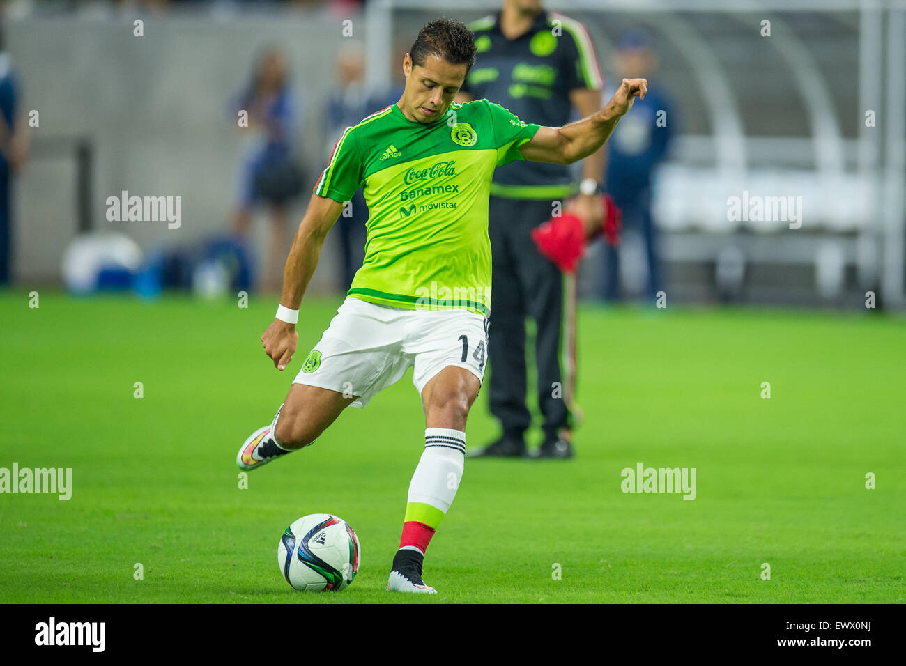 Houston, TX, USA. 1st July, 2015. Mexico forward Javier Hernandez (14) warms up prior to an international soccer match between Honduras and Mexico at NRG Stadium in Houston, TX. Trask Smith/CSM/Alamy Live News Stock Photo