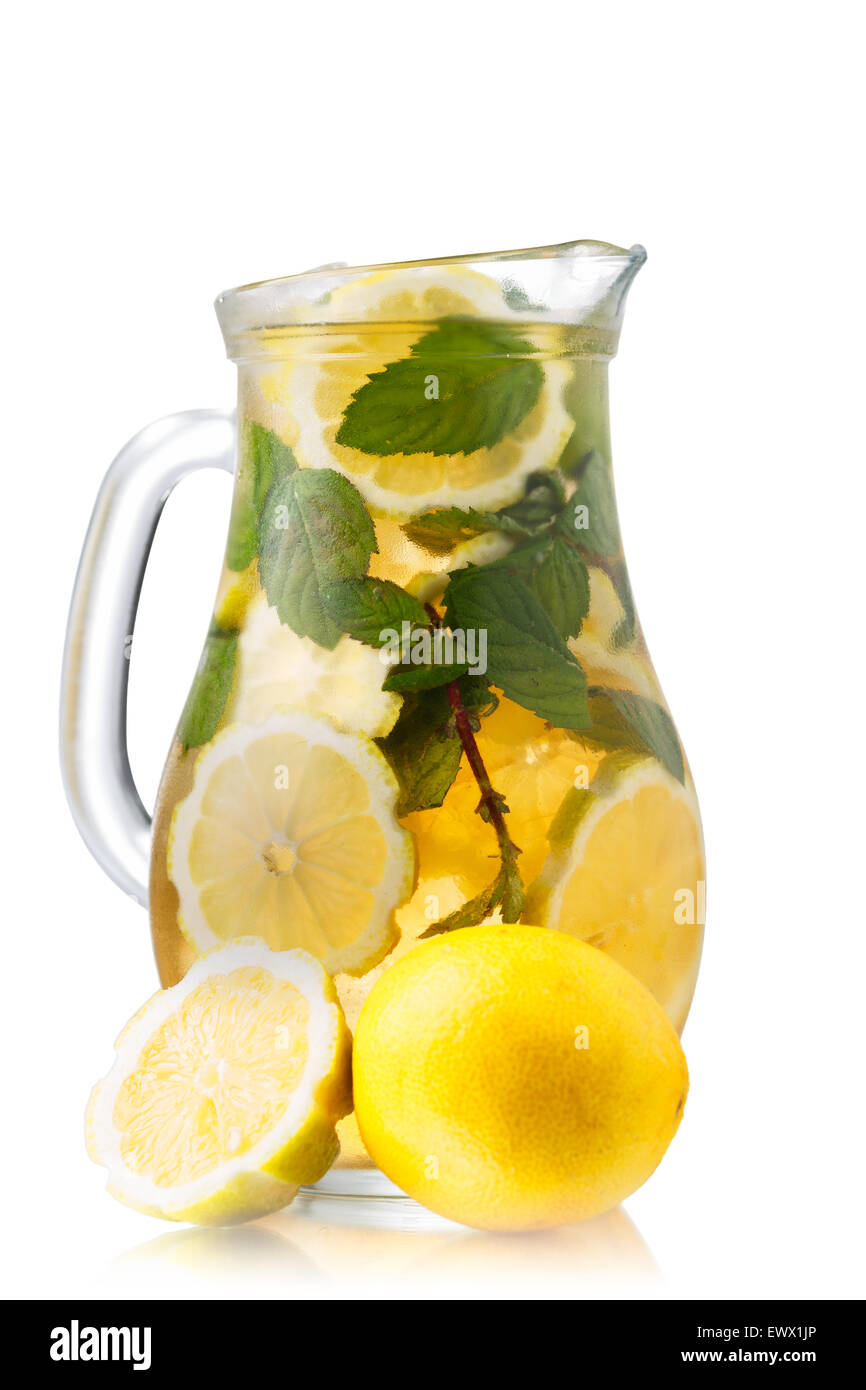 Pitcher of sweet iced green tea with lemon and mint. Stock Photo
