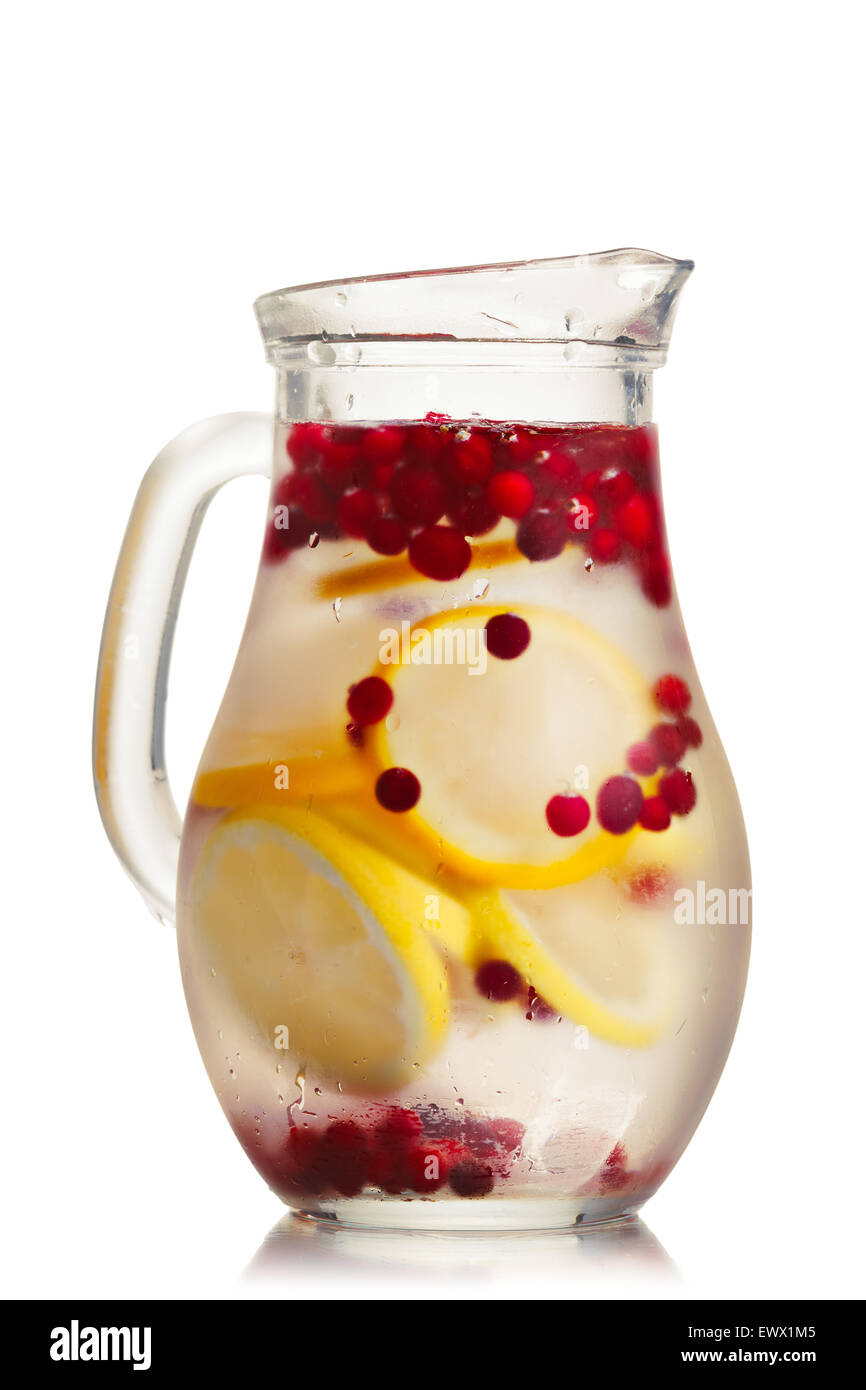 Cranberry lemon detox water in a glass jug. Healthy water with infused