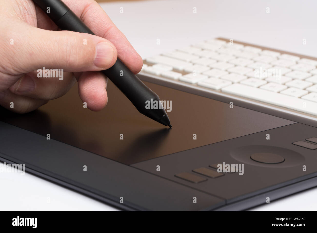 Closeup Of One Hand Drawing On A Computer Graphics Tablet Stock Photo ...