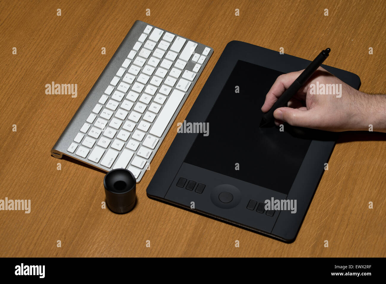 Closeup Of One Hand Drawing On A Computer Graphics Tablet Stock Photo ...