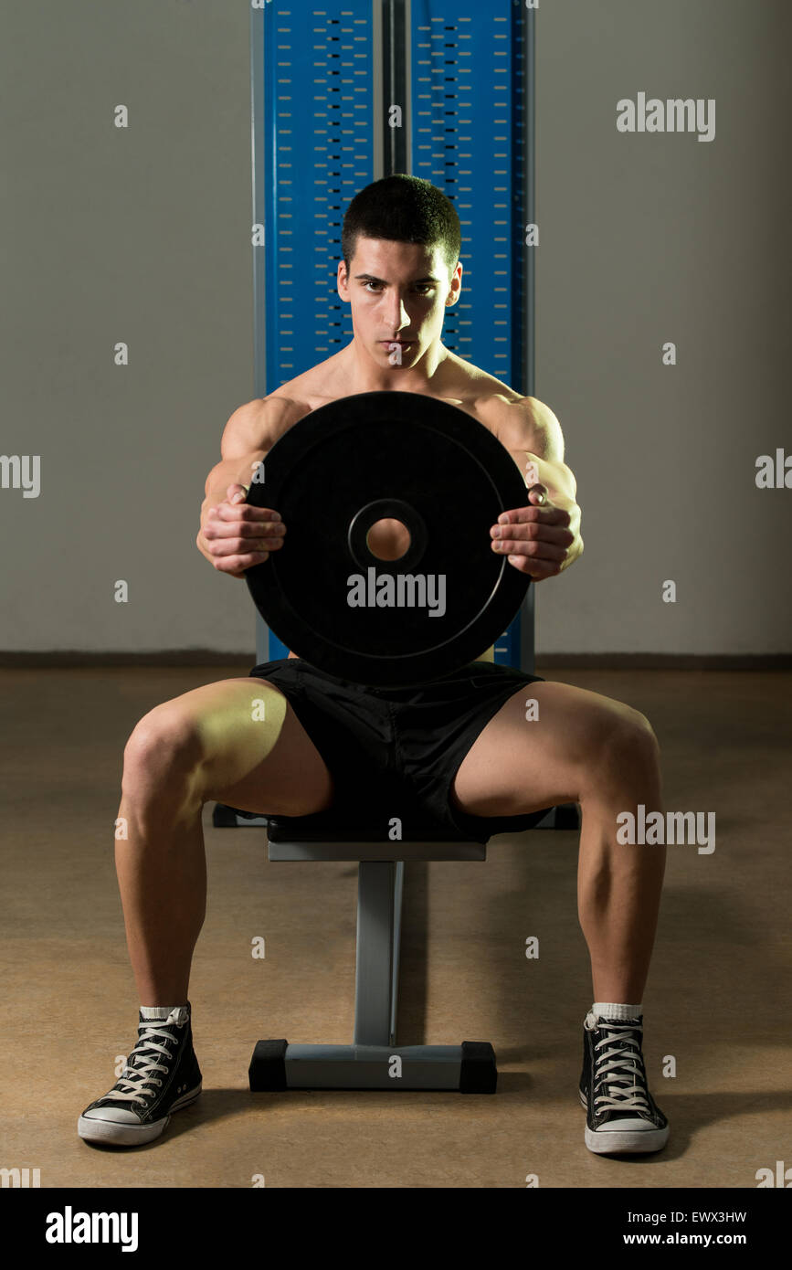 Exercise For Shoulders Front Plate Raise Stock Photo Alamy