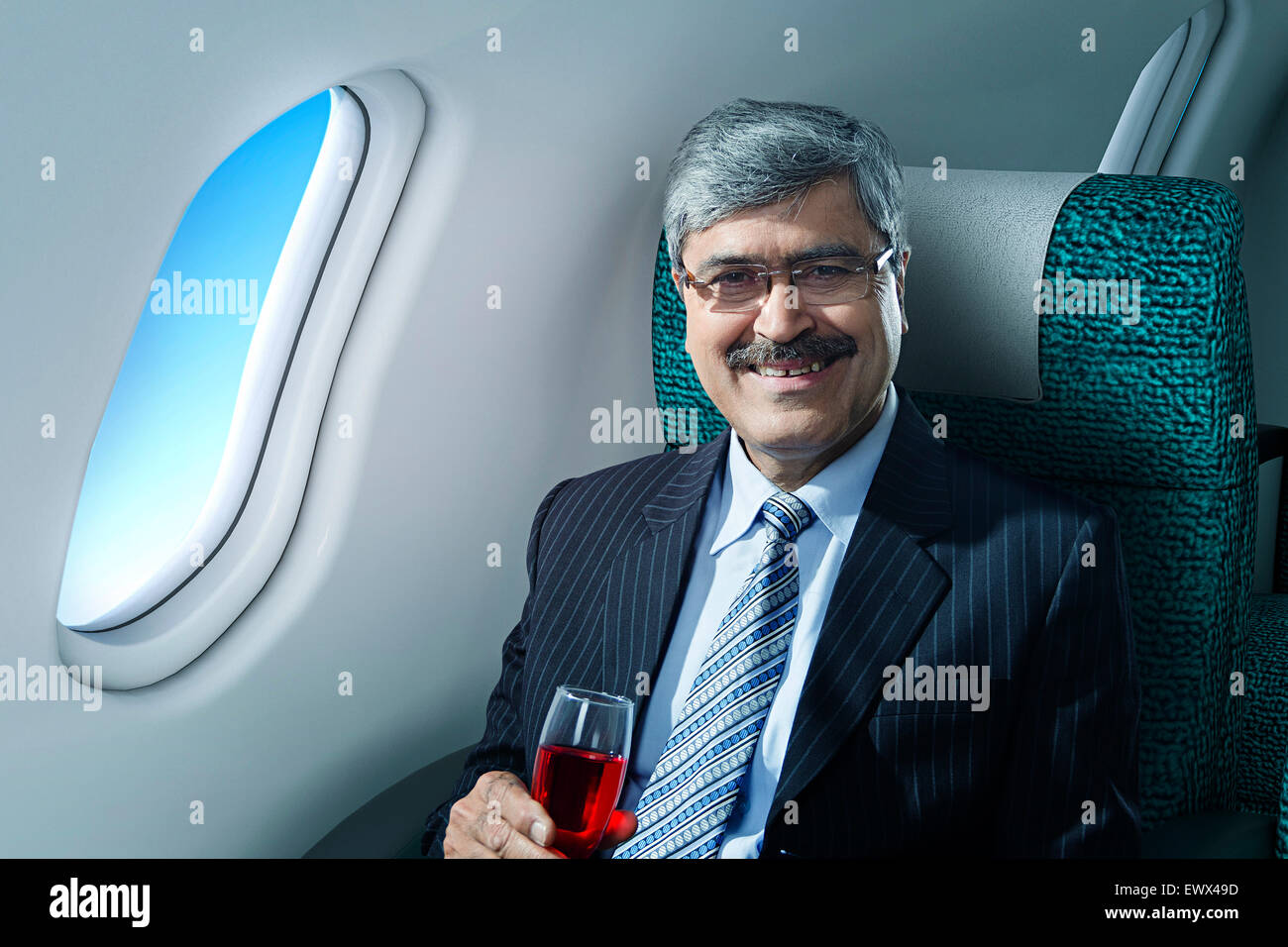 1 Business Man Sitting Aeroplane happy Journey Stock Photo