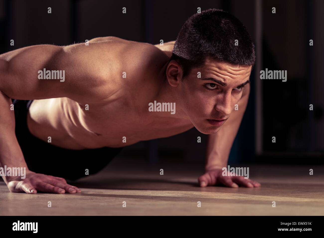 Young Man Exercising Push Ups Stock Photo - Alamy