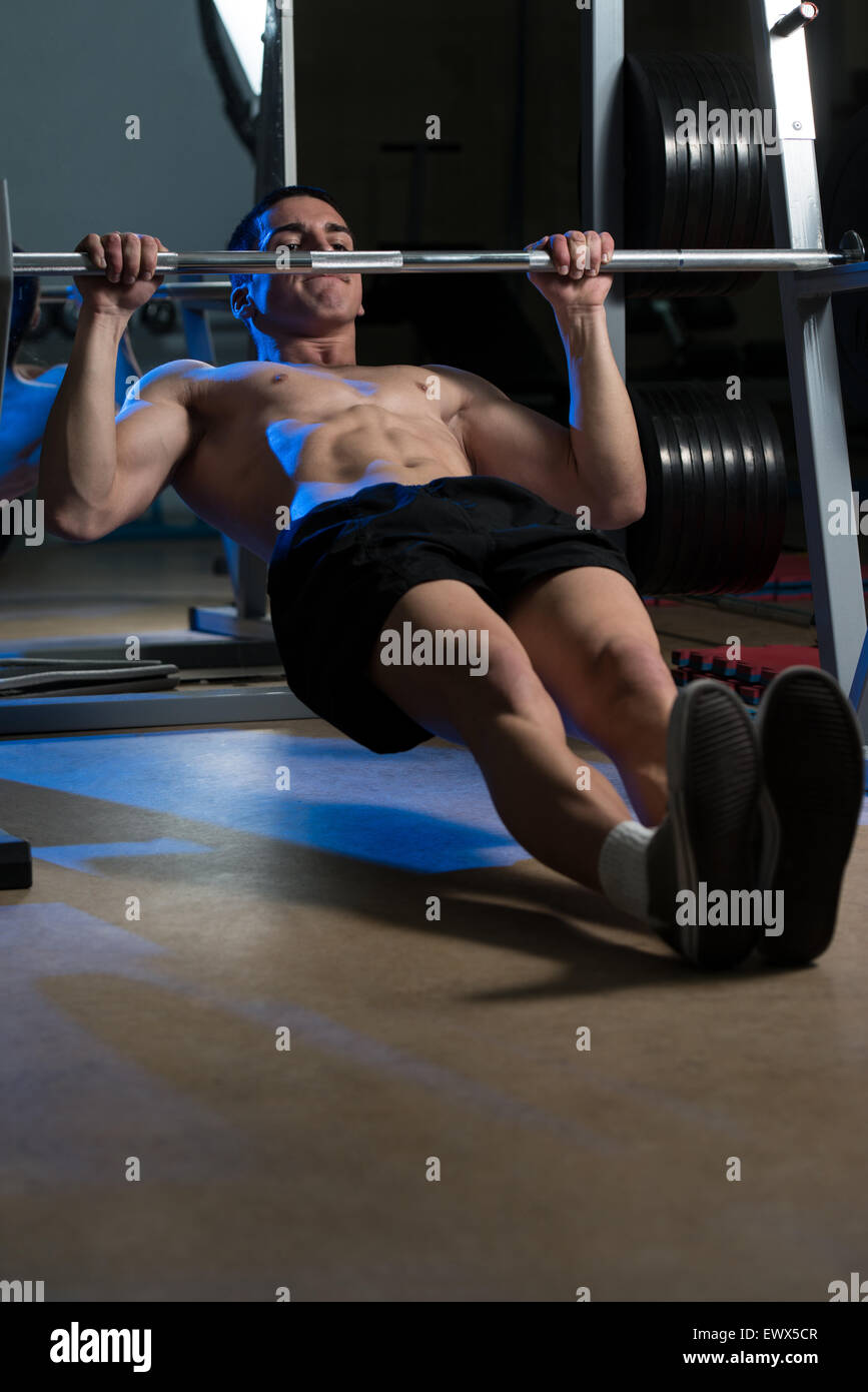 Back Exercises On Horizontal Barbell Pull Up Stock Photo - Alamy