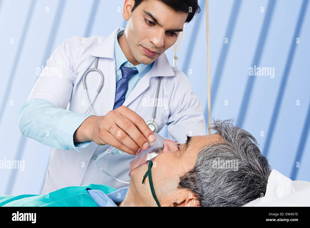 indian Doctor Patient Emergency Oxygen Mask Stock Photo