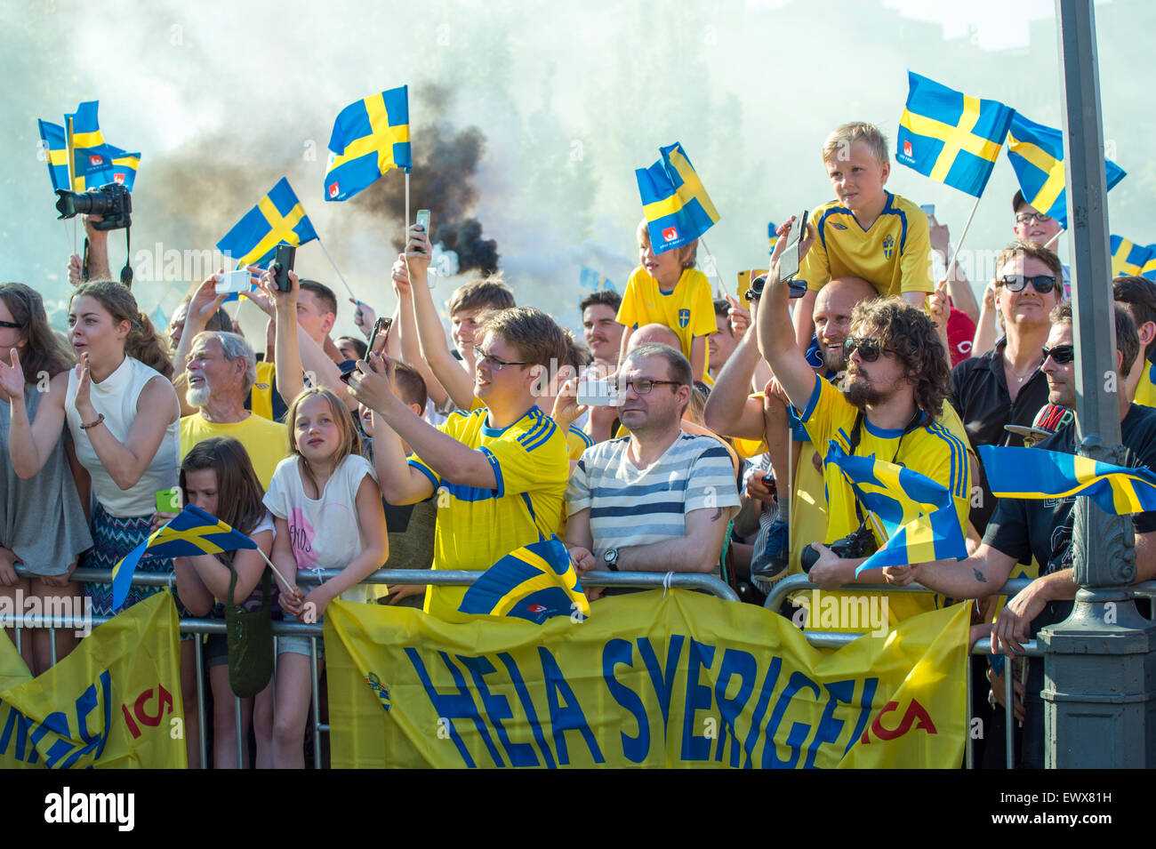 Thousands of Swedish football fans welcome back the Sweden players who won the UEFA European Under-21 Football Championship. Stock Photo