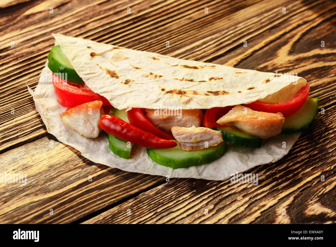 Traditional gyros pita wrap with chicken and vegetables Stock Photo Alamy