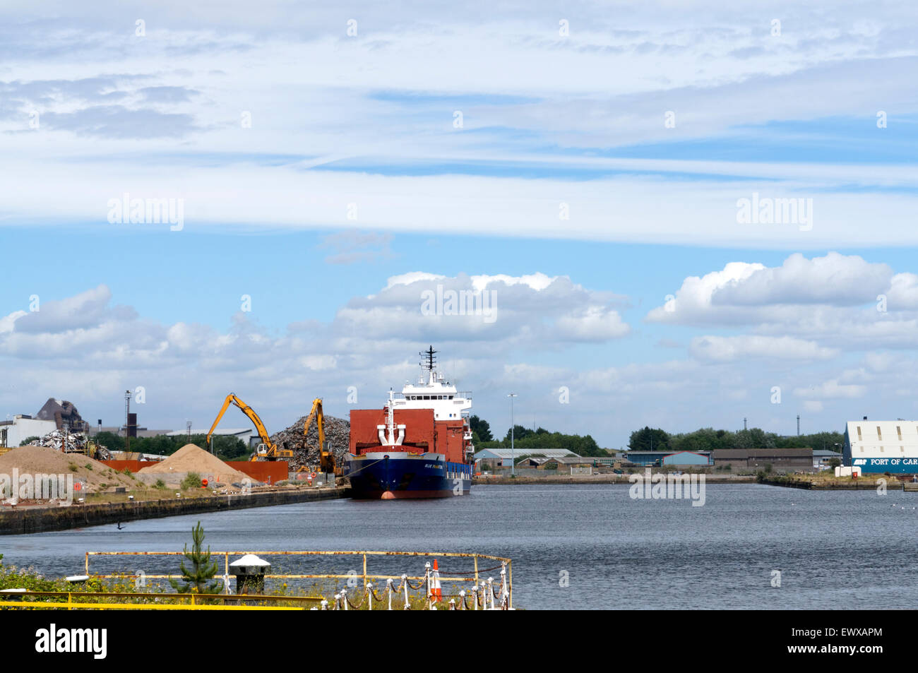 Ship being loaded with scrap iron, Roath Dock, Cardiff, Wales, UK. Stock Photo