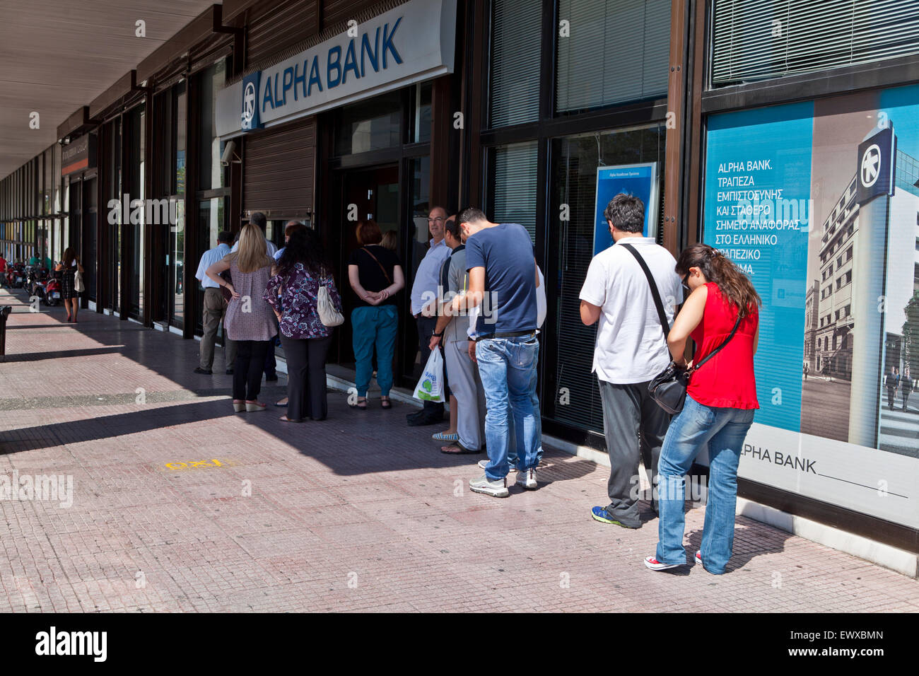 Athens, Greece. 2nd July, 2015. Alpha Bank queues amid the Bank capital controls in Athens, Greece. Credit:  Martin Garnham/Alamy Live News Stock Photo