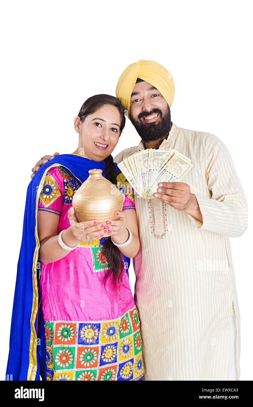 2 indian Punjabi Married Couple Saving money Piggy Bank Stock Photo Alamy