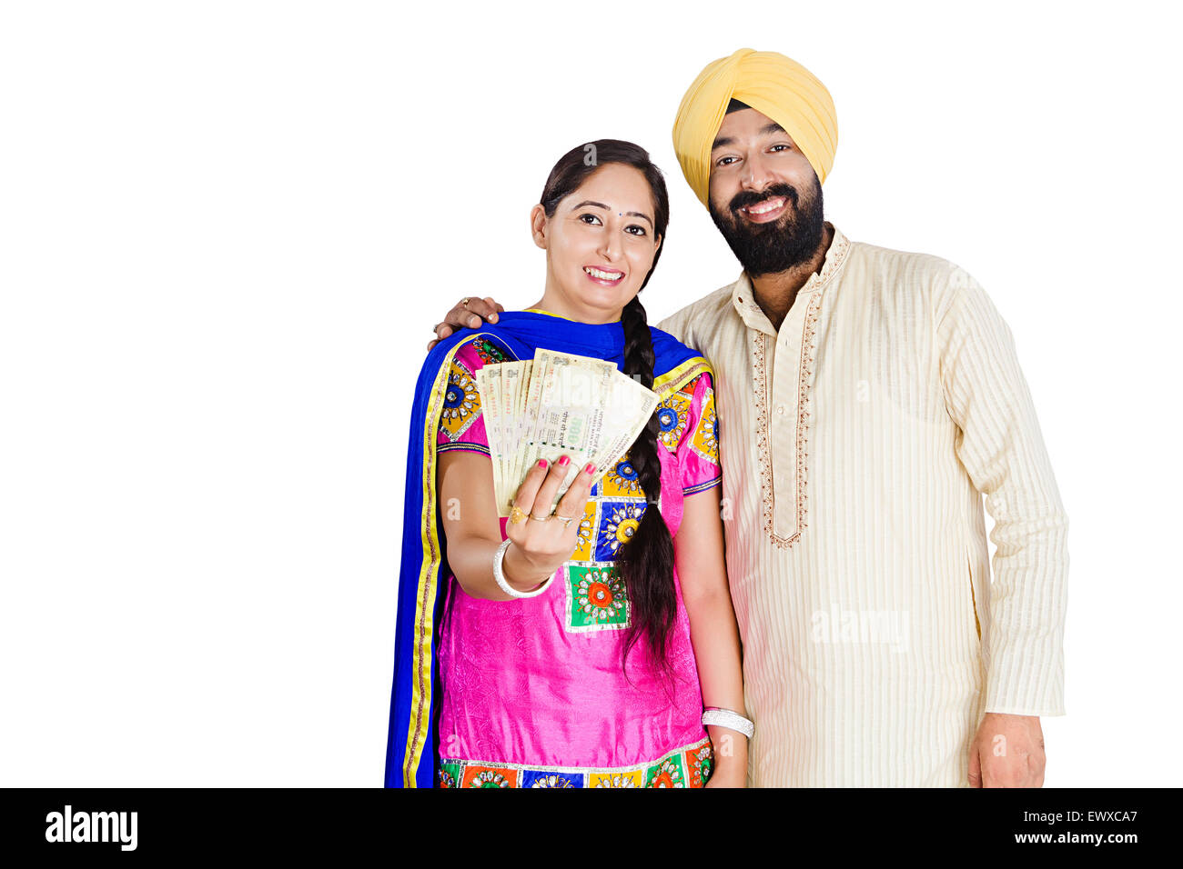 2 indian Punjabi Married Couple showing money Stock Photo - Alamy