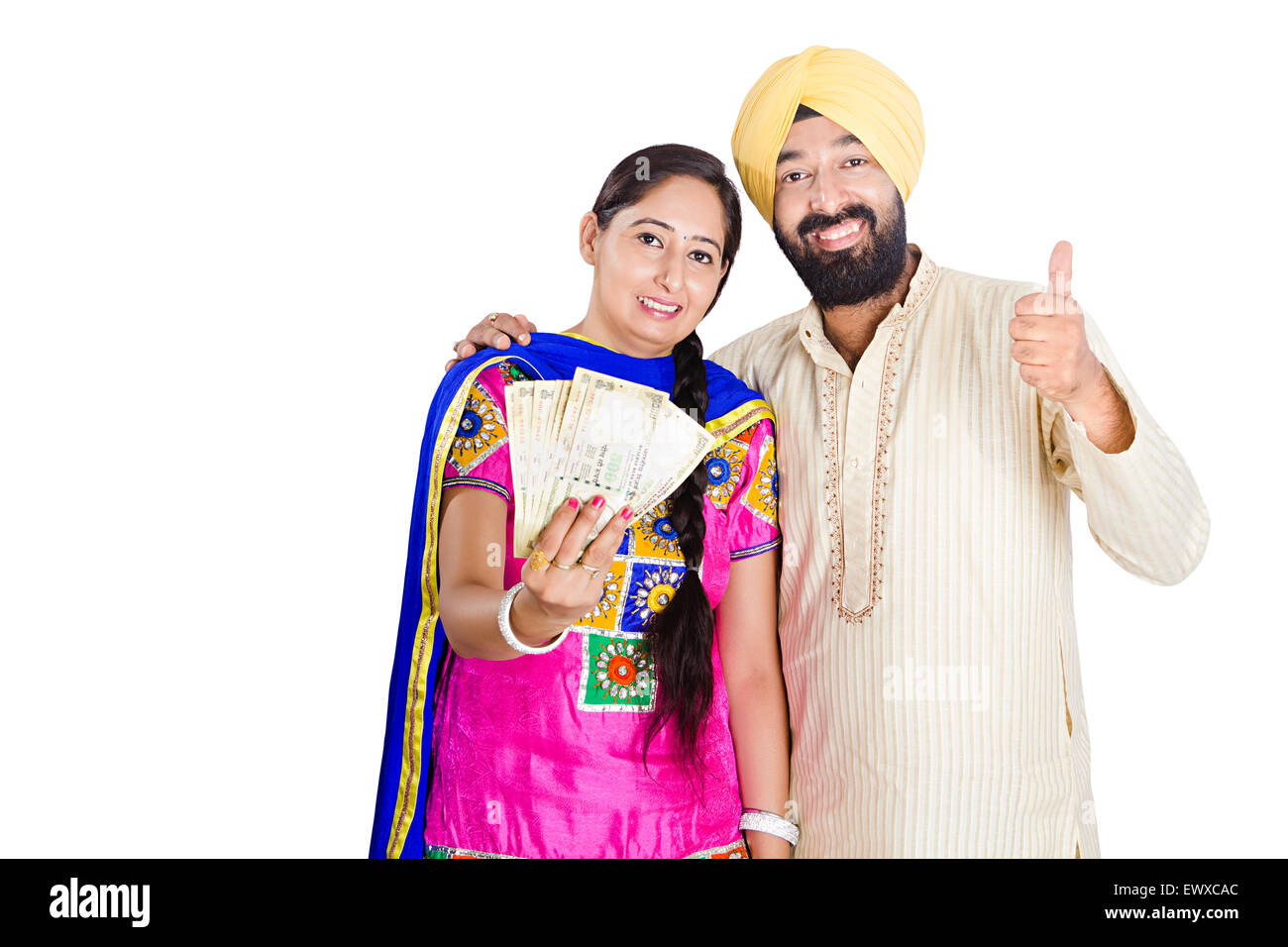 2 indian Punjabi Married Couple showing money Stock Photo - Alamy
