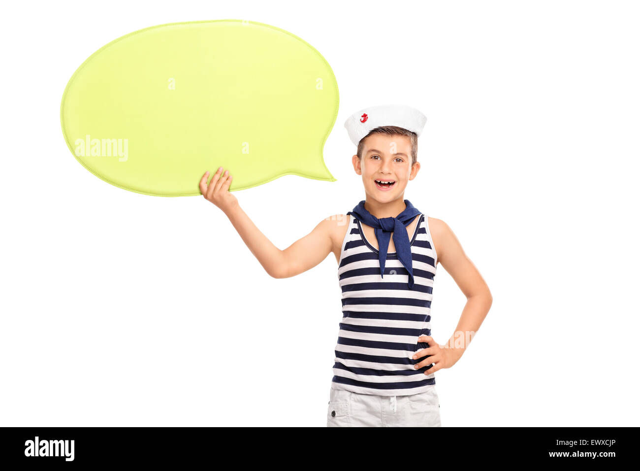 Little kid in a sailor outfit holding a speech bubble and looking at the camera isolated on white background Stock Photo