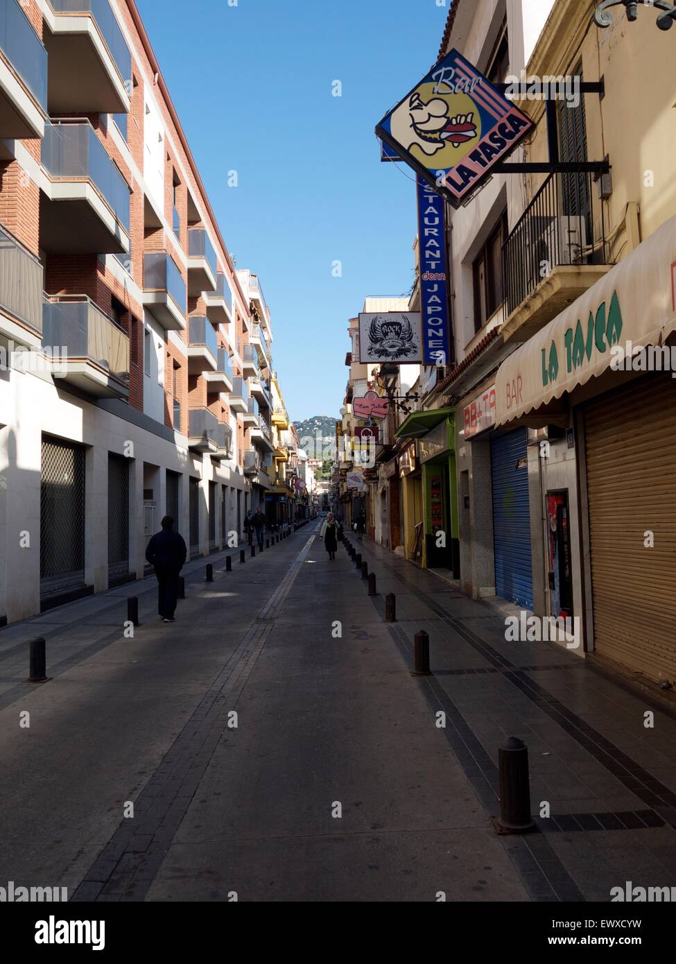 Typical street in Spain with shops and signs Stock Photo
