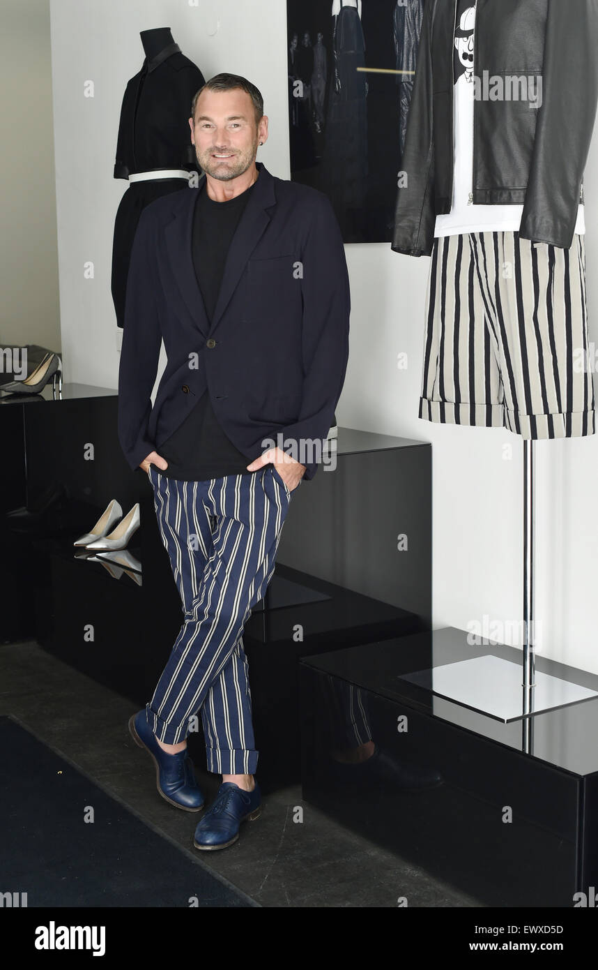 Berlin, Germany. 1st July, 2015. EXCLUSIVE - German fashion designer Michael Michalsky smiles as he is pictured in his studio in Berlin, Germany, 1 July 2015. Photo: Jens Kalaene/dpa/17�Թ����� Live News Stock Photo