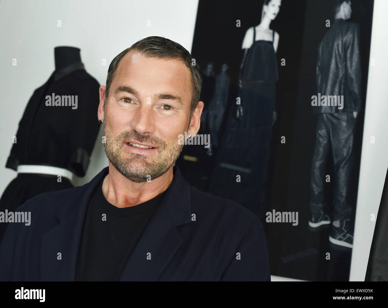 Berlin, Germany. 1st July, 2015. EXCLUSIVE - German fashion designer Michael Michalsky smiles as he is pictured in his studio in Berlin, Germany, 1 July 2015. Photo: Jens Kalaene/dpa/17�Թ����� Live News Stock Photo