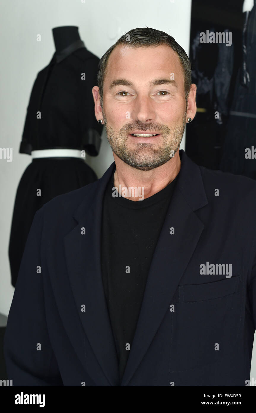 Berlin, Germany. 1st July, 2015. EXCLUSIVE - German fashion designer Michael Michalsky smiles as he is pictured in his studio in Berlin, Germany, 1 July 2015. Photo: Jens Kalaene/dpa/17�Թ����� Live News Stock Photo