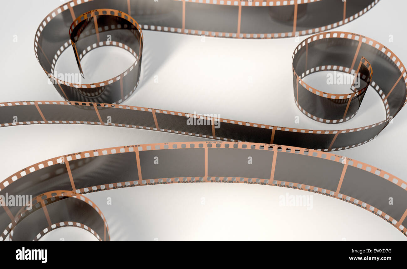 A strip of blank old vintage camera film curled up on an isolaed studio ...