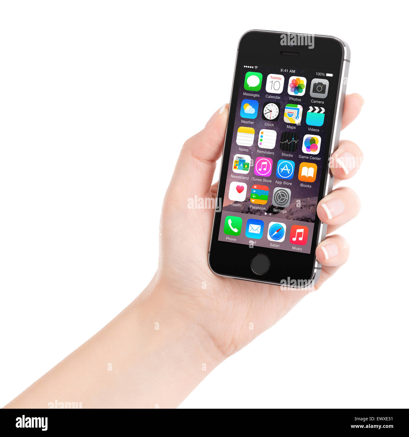 Varna, Bulgaria - December 07, 2013: Female hand holding Apple Space Gray iPhone 5S displaying iOS 8 mobile operating system Stock Photo