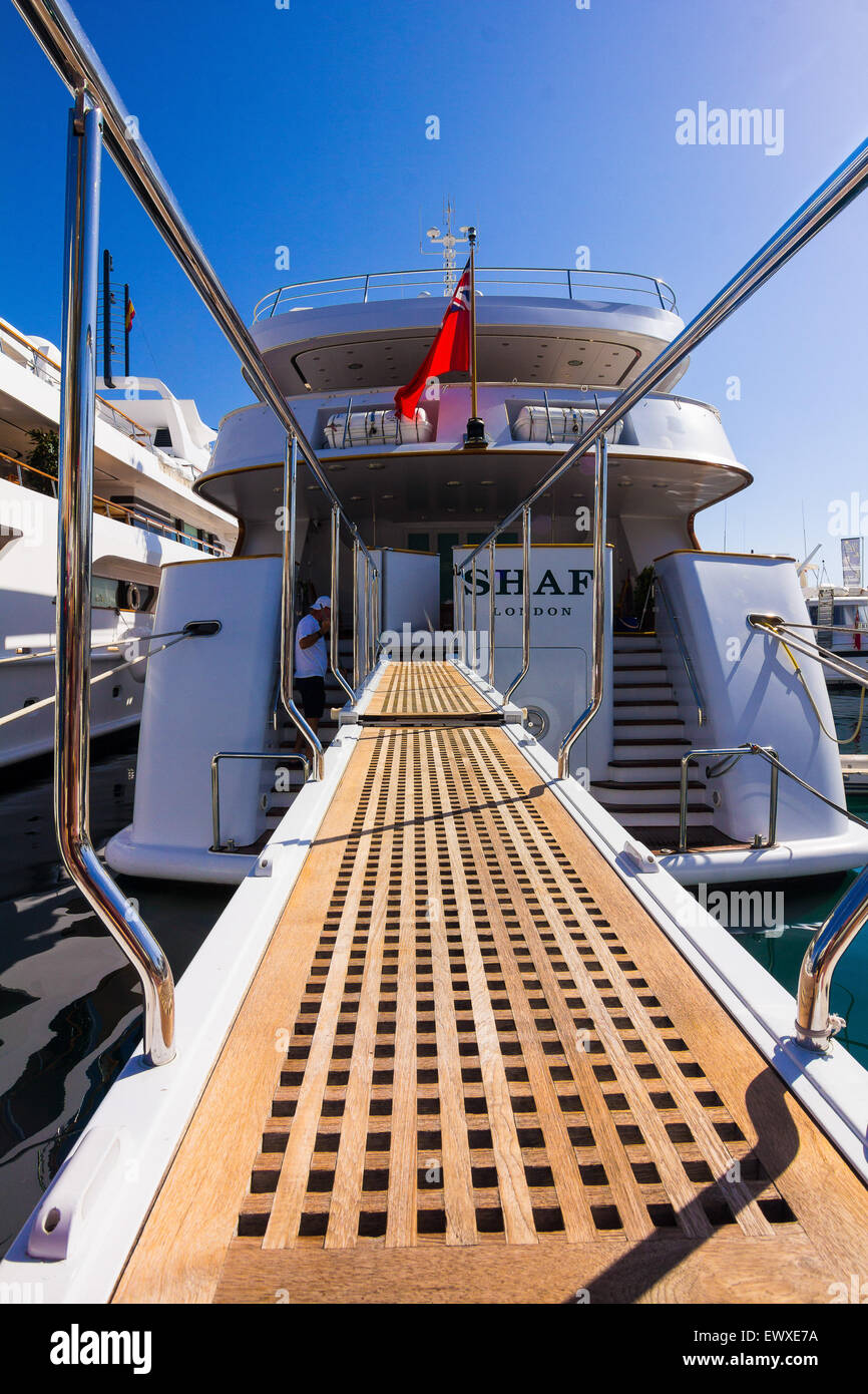 Wooden access ramp to a modern yacht Stock Photo