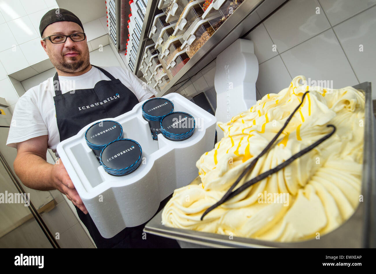 Ricco Klotzsche from company IceGuerilla.de GmbH & CoKG in Beeskow, Germany shows the special transport box for ice cream, 2 July 2015. The award-winning company has released its webshop for the Eisbestellung (ice-cream ordering). Here customers can select their personal favourites flavours from a basic selection, have them combined and home delievered. The ice cream is made by the in-house production. Developed by IceGuerilla.de, innovative transport methods by which a dry thermal transport box that can keep the ice-cream cool for up to 48 hours. Photo: PATRICK PLEUL/dpa Stock Photo