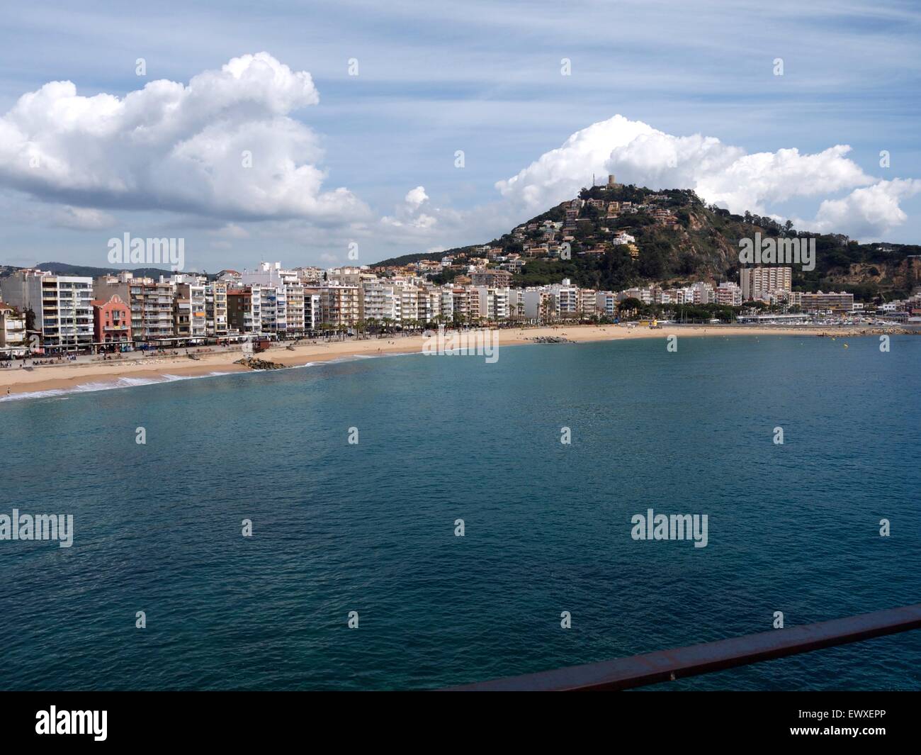 Beach resort and surround hill, clouds slowly creeping in Stock Photo ...