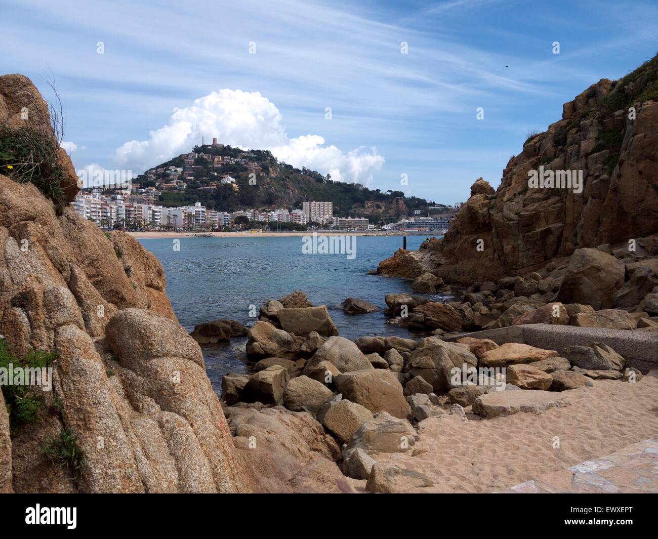 Beach resort and surround hill, clouds slowly creeping in Stock Photo ...