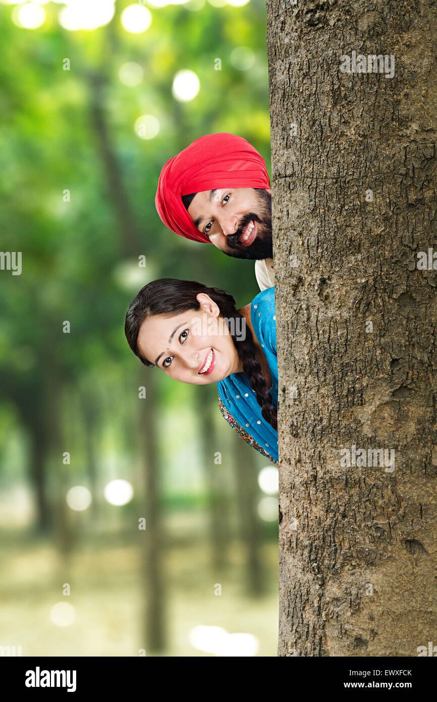 2 indian Punjabi Married Couple park Hide and Seek enjoy Stock Photo ...