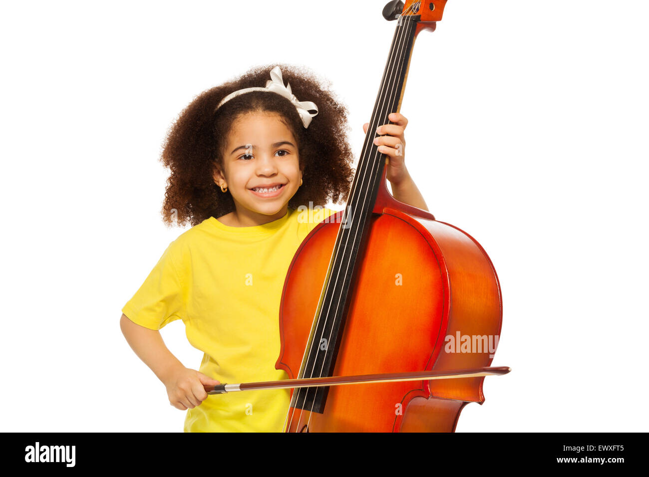 African girl plays violoncello with fiddlestick Stock Photo