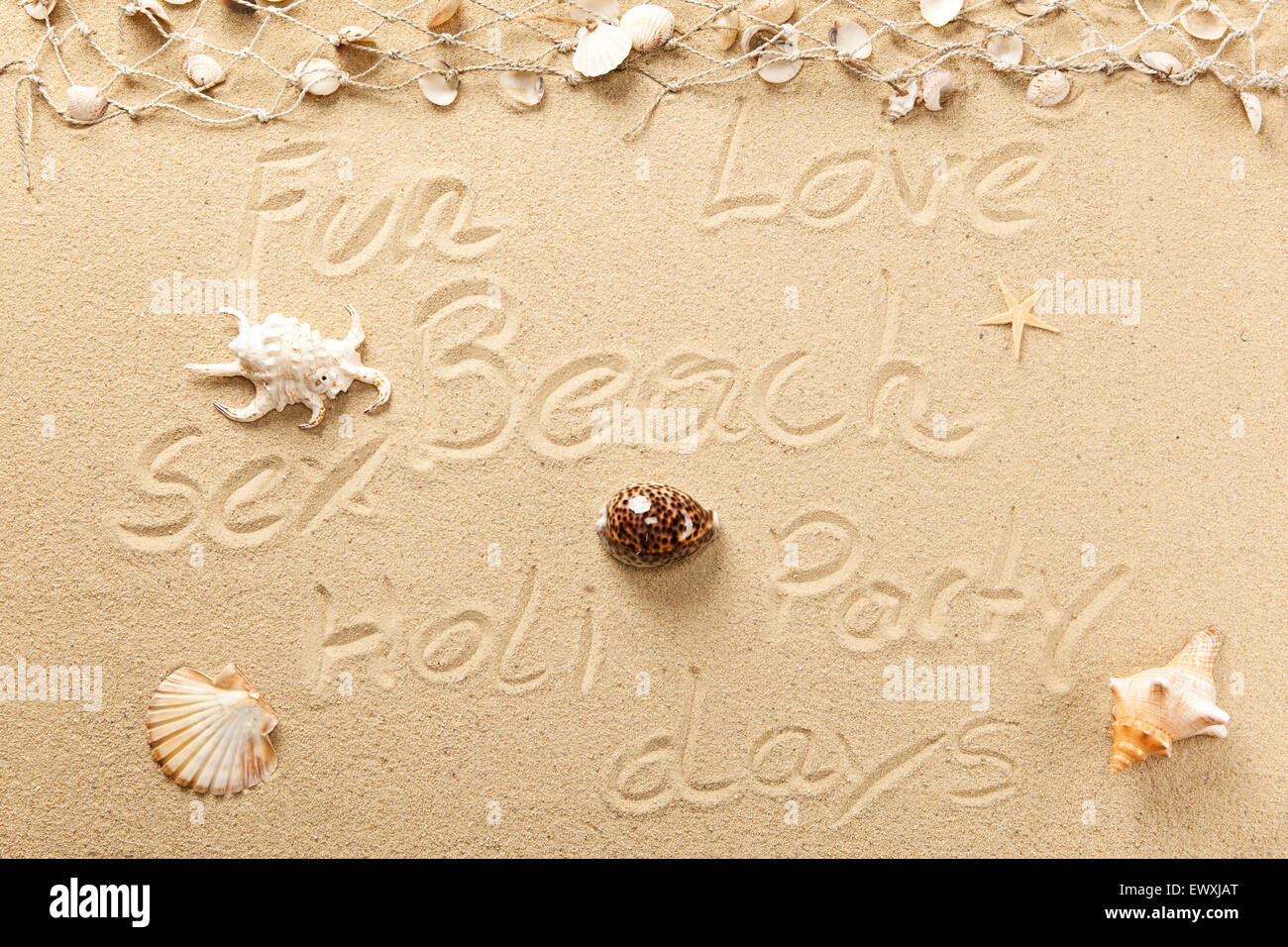 Holiday keywords in the sand Stock Photo