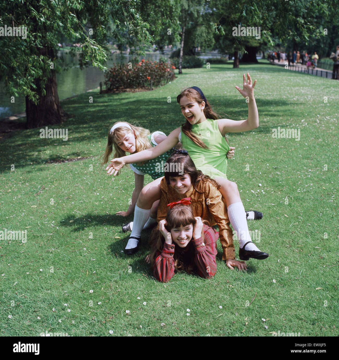 Playing four girls 1970s hi-res stock photography and images - Alamy