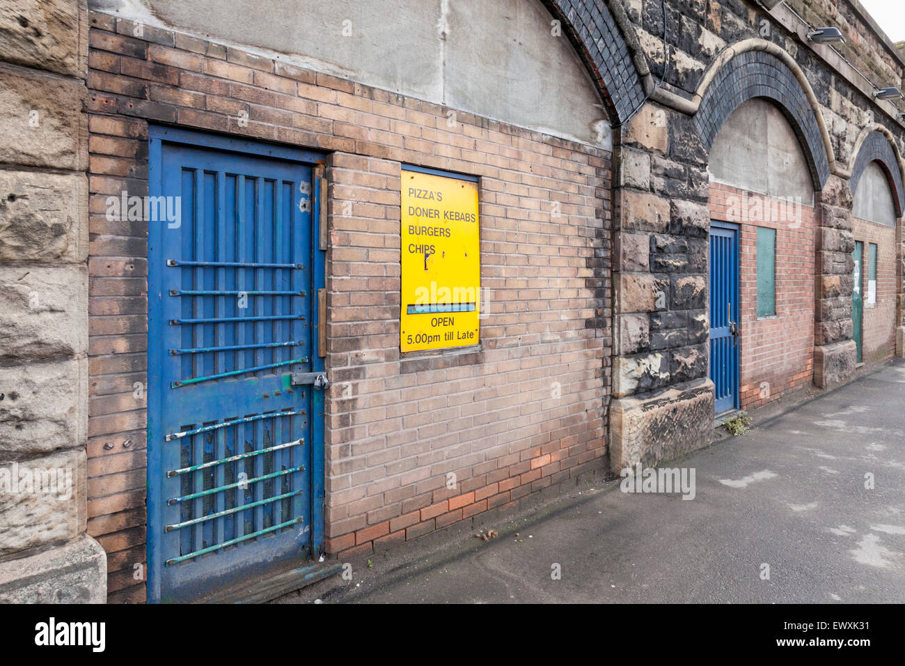 Businesses built into railway arches, Sheffield, England, UK Stock Photo