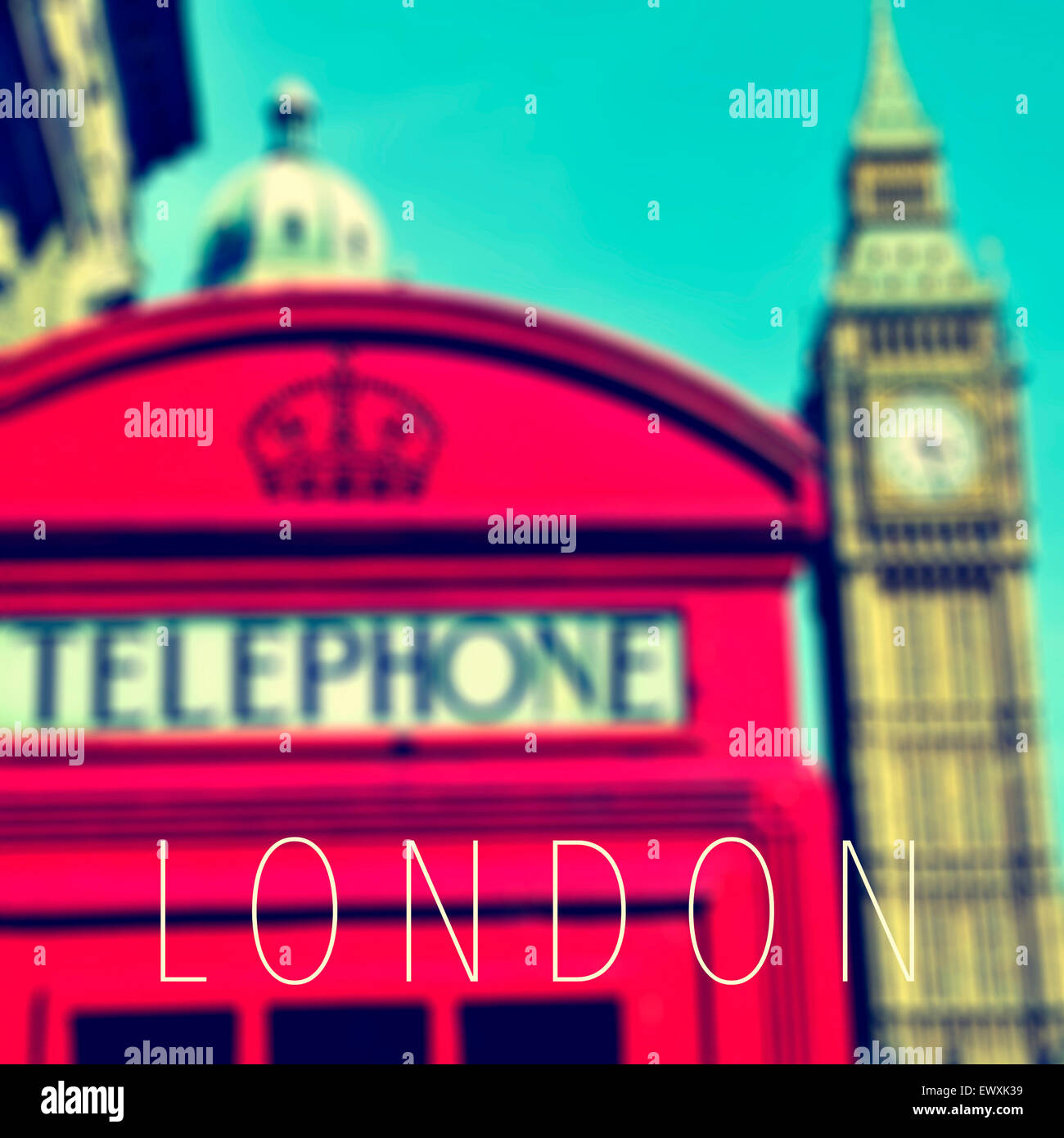 the word London and a classic red telephone booth and the Big Ben in the background, in London, United Kingdom Stock Photo