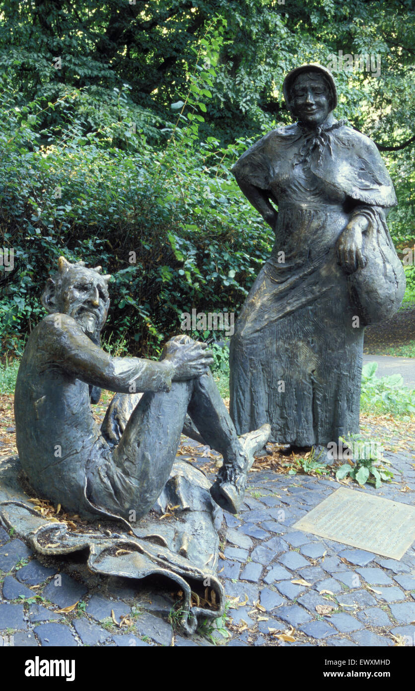DEU, Germany, Aachen, sculpture of the devil and the farmer´s wife at the Lousberg.  DEU, Deutschland, Aachen, Skultur des Teufe Stock Photo