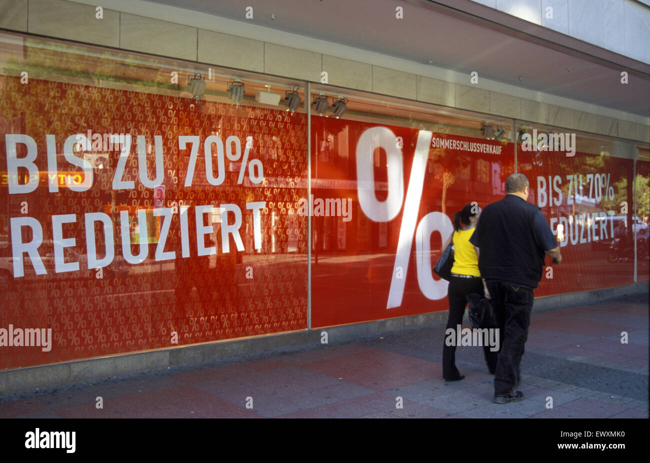 DEU, Germany, Aachen, bill in a shop window campaigns sales discounts.  DEU, Deutschland, Aachen, Plakat in Schaufenster wirbt m Stock Photo