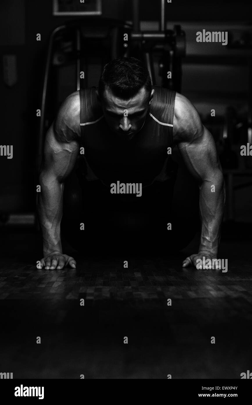 Young Athlete Doing Pushups As Part Of Bodybuilding Training Stock