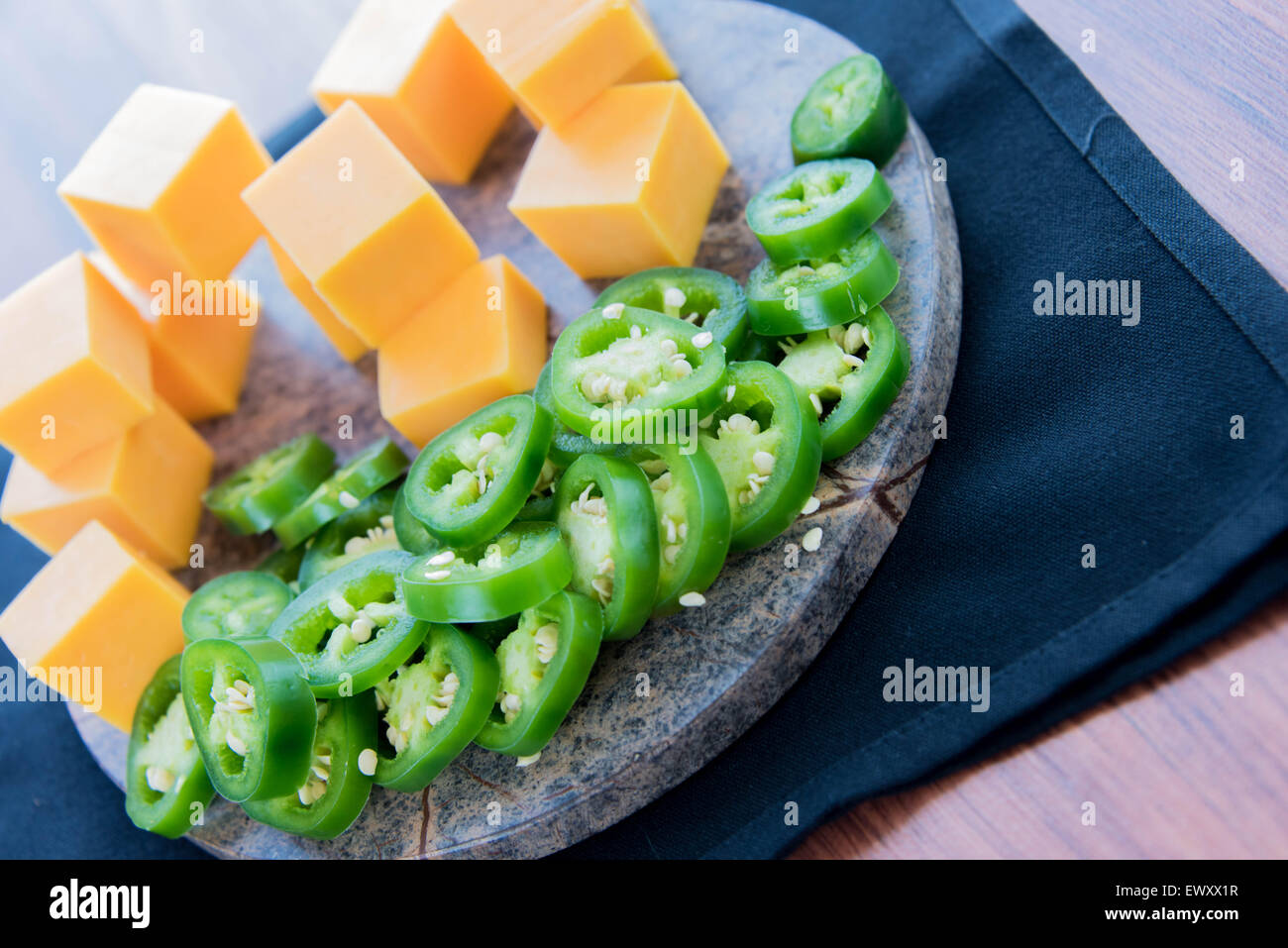 fresh sliced jalapeno peppers and cheddar cheese Stock Photo Alamy