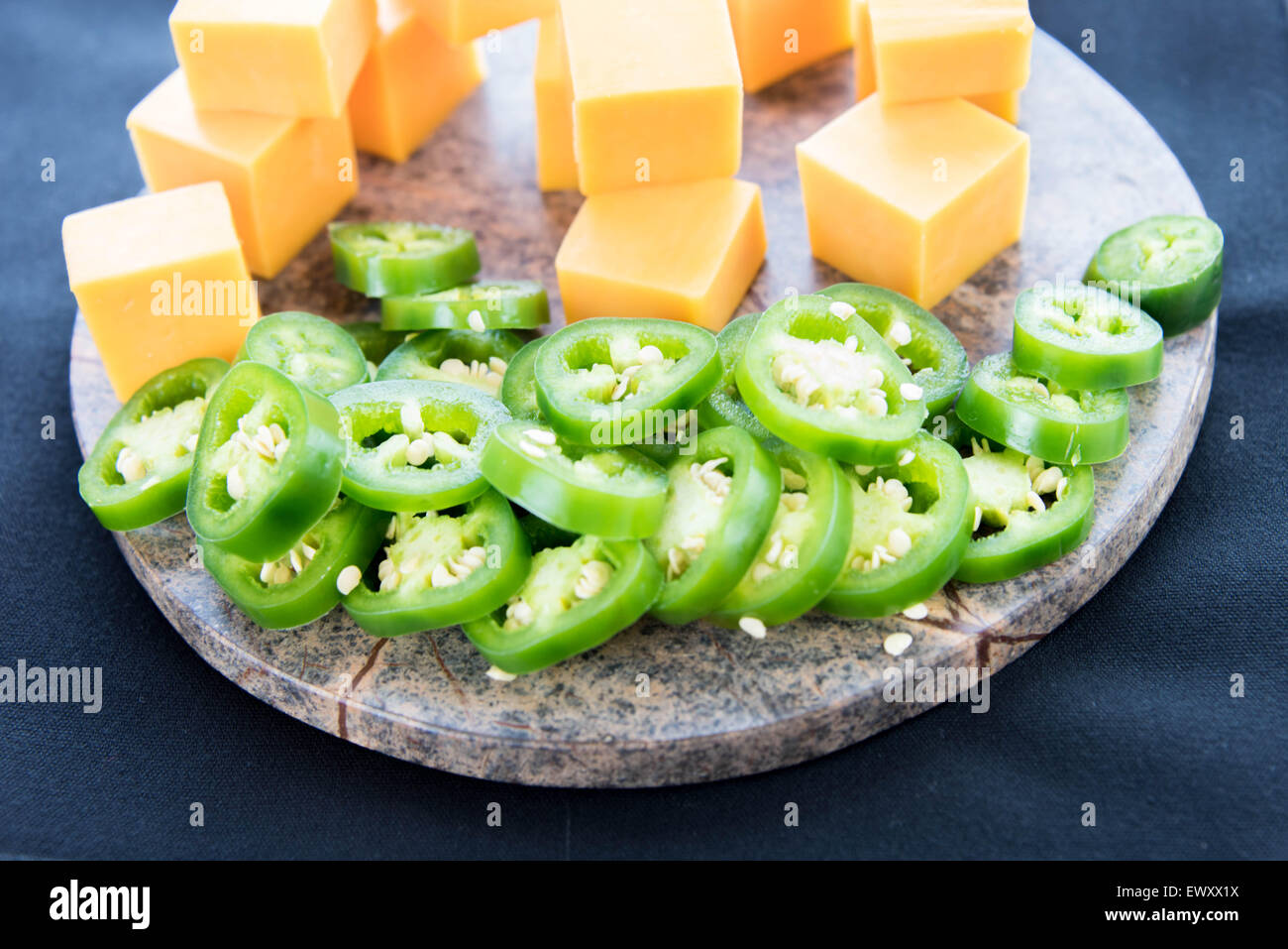 fresh sliced jalapeno peppers and cheddar cheese Stock Photo Alamy