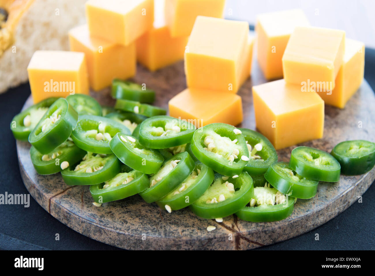 fresh sliced jalapeno peppers and cheddar cheese Stock Photo Alamy