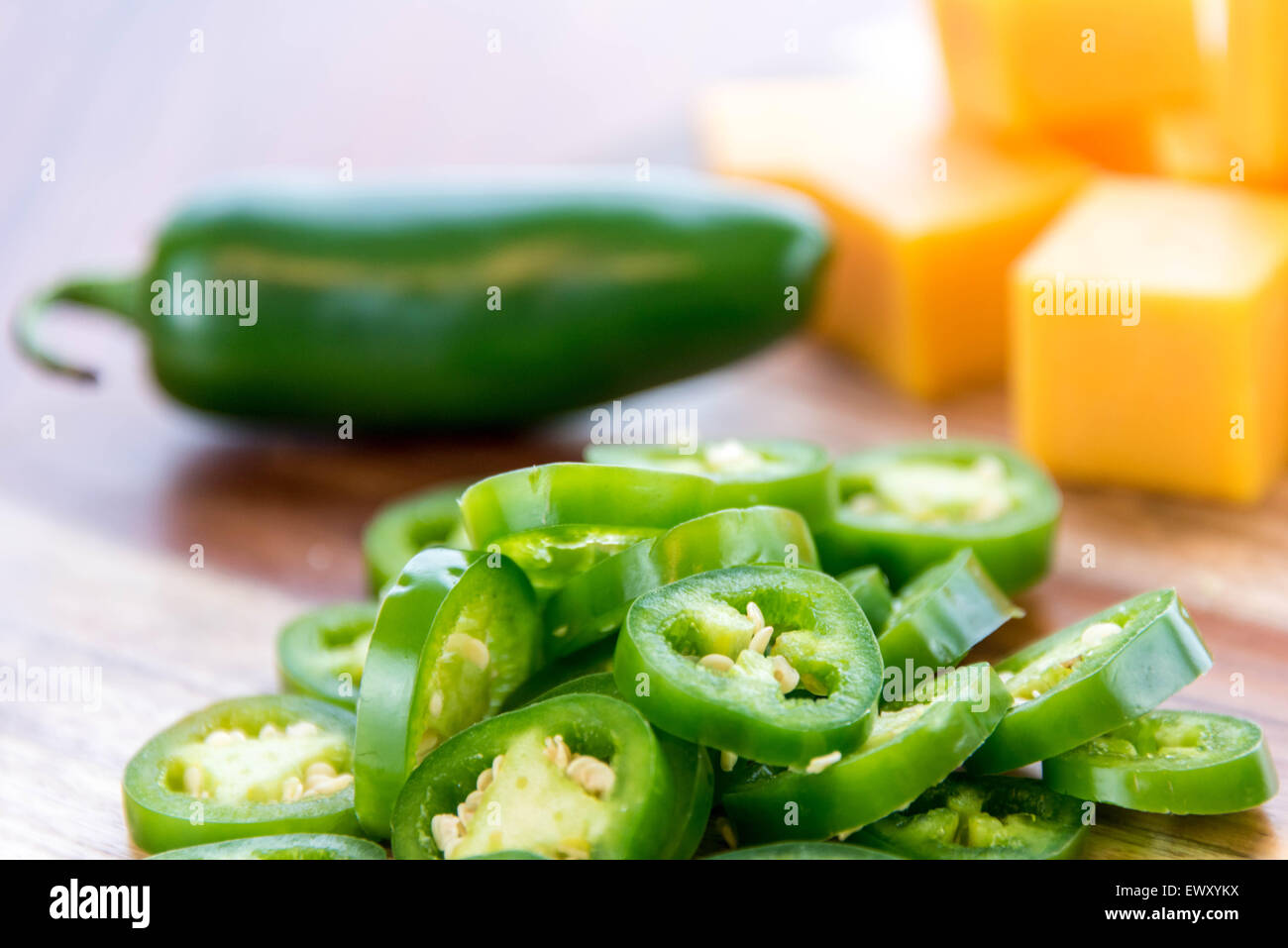 fresh sliced jalapeno peppers and cheddar cheese Stock Photo Alamy