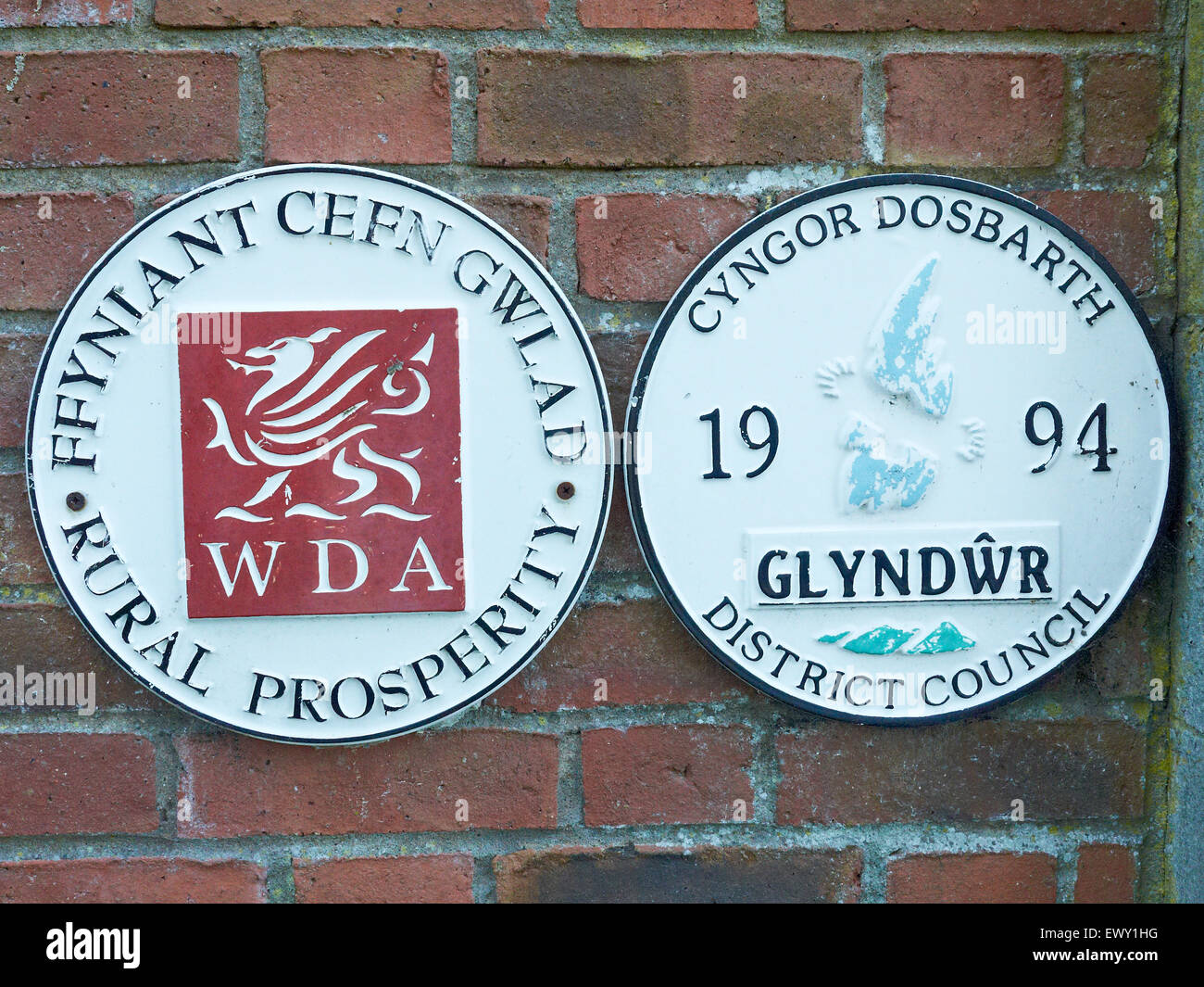 Plaque awards on outside wall in Chirk Wales UK Stock Photo