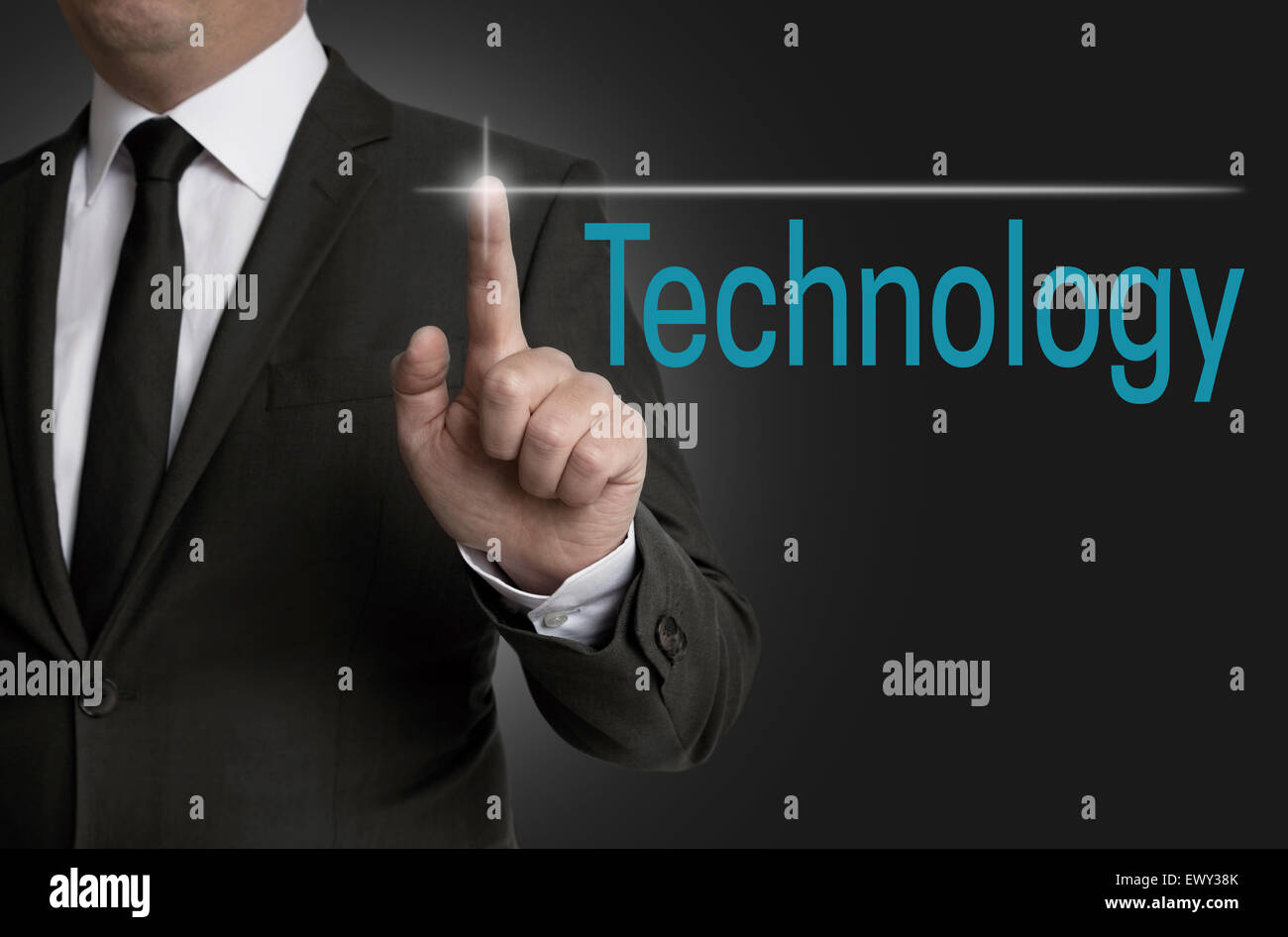 Technology touchscreen is operated by businessman. Stock Photo